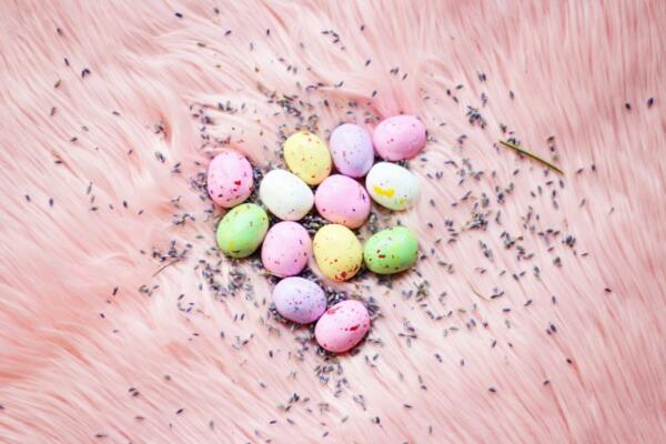 colorful Easter eggs on pink background